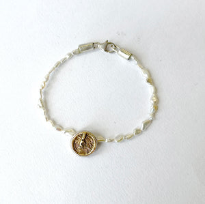 Pearl bracelet with Water Charm